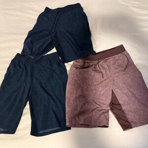 THREE PAIRS OF LIMITED EDITION LULULEMON LINED PACEBREAKER 9" ATHLETIC SHORTS